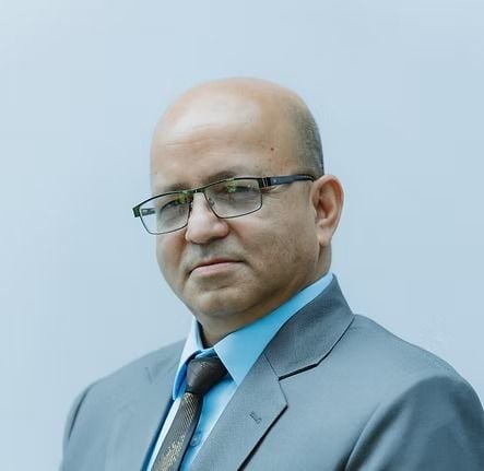 Mr. Mohan Adhikari